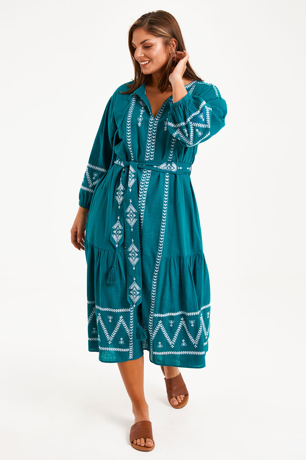 Model Monique wearing size 14 of the Spring Fling Embroidered Dress in colour Jade (Green), from the front, showing the whole outfit