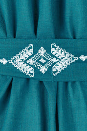 Product shot of the Spring Fling Embroidered Dress in colour Jade (Green), detail