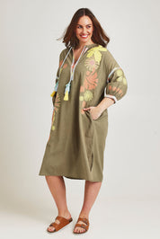 Model Jane wearing size 14 of the Now And Then Embroidered Tunic Dress in colour Khaki, from the front, showing the whole outfit