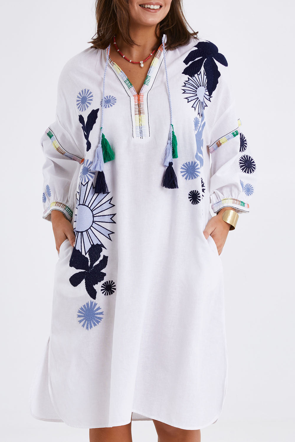Model Monique wearing size 14 of the Now And Then Embroidered Tunic Dress in colour White (White), from the front, cropped image