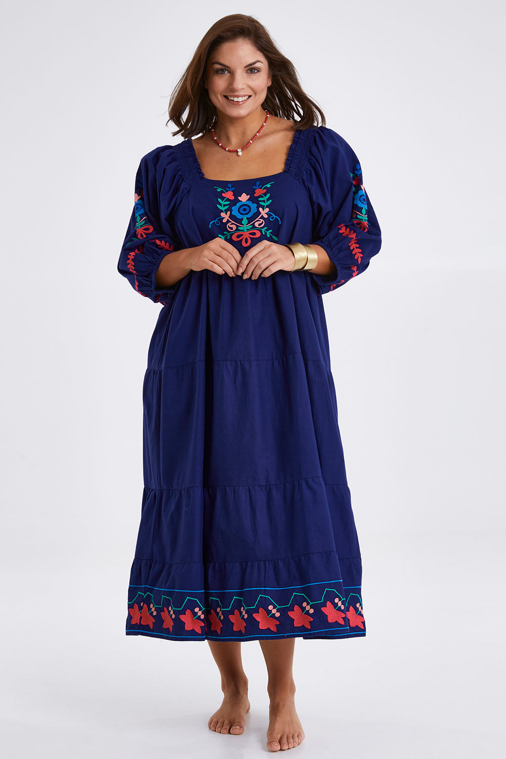 Model Monique wearing size 14 of the Picnic In The Fields Embroidered Dress in colour Navycombo (Blue), from the front, showing the whole outfit