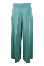 Product shot of the Loves Always Been My Game Pants in colour Leaf (Green), from the back