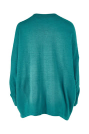 Product shot of the Chill Vibes Slouch Top in colour Jade (Green), from the back