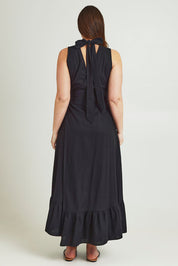 Model Jane wearing size 14 of the La Dolce Vita Back Wrap Maxi in colour Black (Black), from the back