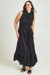 Model Jane wearing size 14 of the La Dolce Vita Back Wrap Maxi in colour Black (Black), from the front, showing the whole outfit