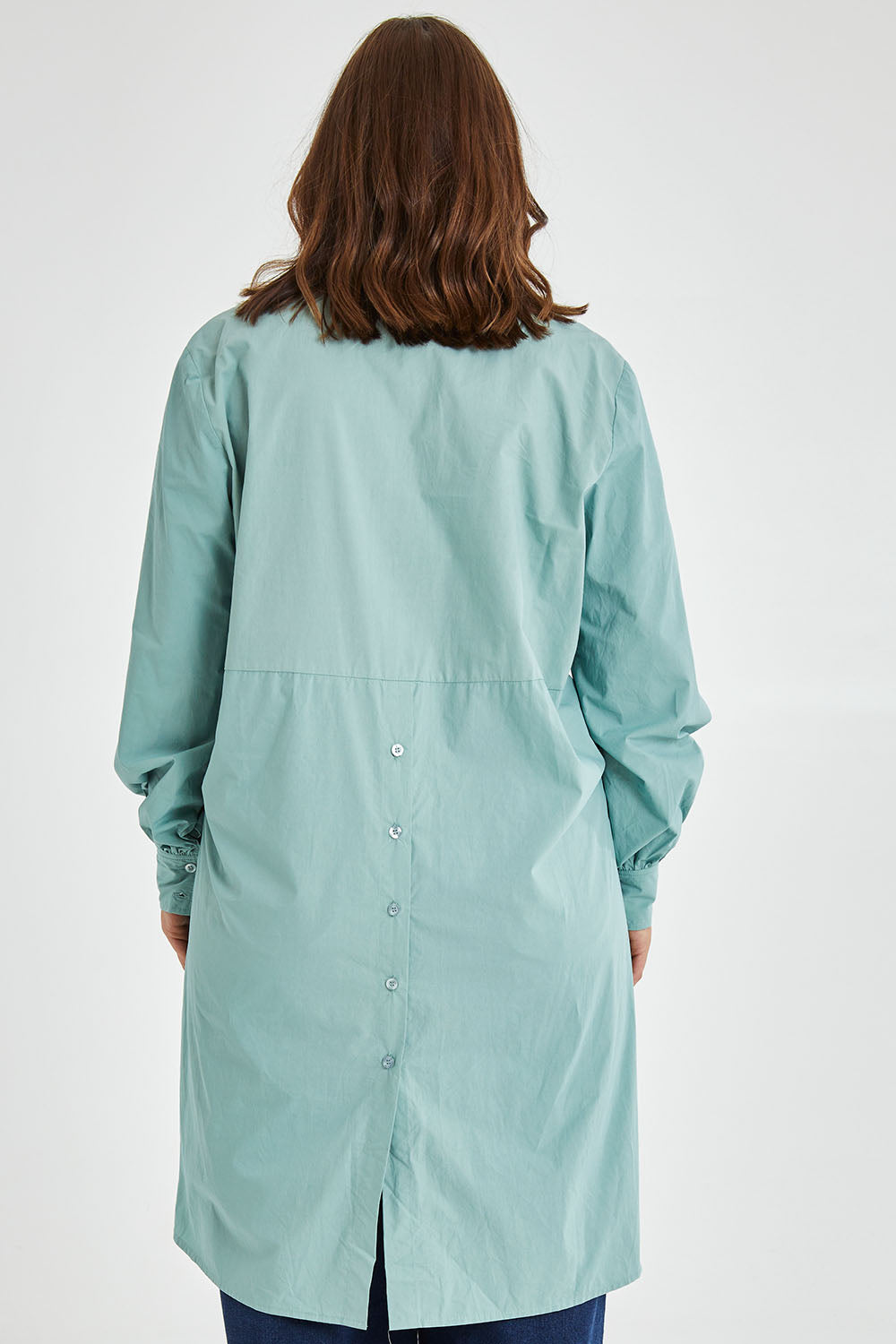 Model Monique wearing size 14 of the Ringmaster Of My Life Shirt in colour Sage (Green), from the back