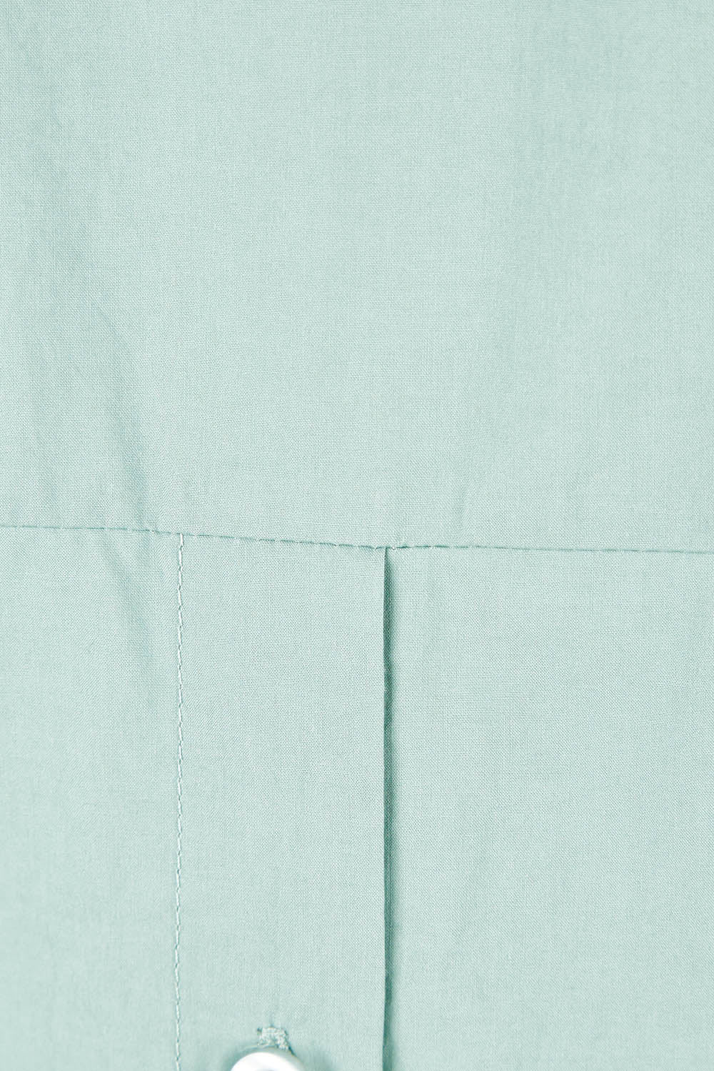Product shot of the Ringmaster Of My Life Shirt in colour Sage (Green), detail