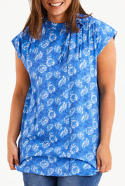 Model Monique wearing size 14 of the Forget Me Not Sleeveless Blouse in colour Bluewhite (Blue), from the front, cropped image