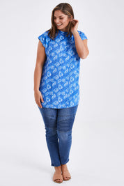 Model Monique wearing size 14 of the Forget Me Not Sleeveless Blouse in colour Bluewhite (Blue), from the front, showing the whole outfit
