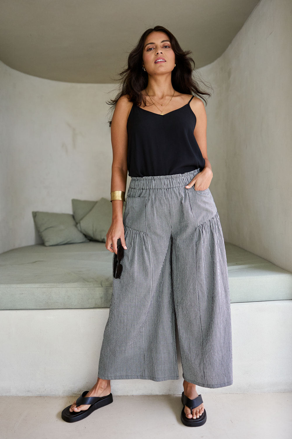 Model Tahnee wearing size 10 of the Break Of Day Cotton Pants in colour Blackcheck (Black), from the front, showing the whole outfit