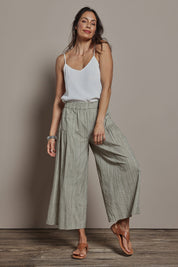 Model Amanda wearing size 10 of the Break Of Day Cotton Pants in colour Stone, from the front, showing the whole outfit