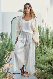 Model Tegand wearing size 10 of the Break Of Day Cotton Pants - Whitestripe in colour Whitestripe, from the front