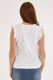 Model Sally wearing size 10 of the For The Frill Of It Tee in colour White (White), from the back