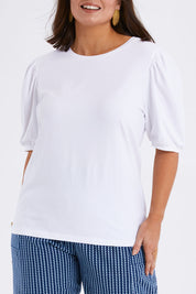 Model Monique wearing size 14 of the Sunday Brunch Tee in colour White (White), from the front, cropped image