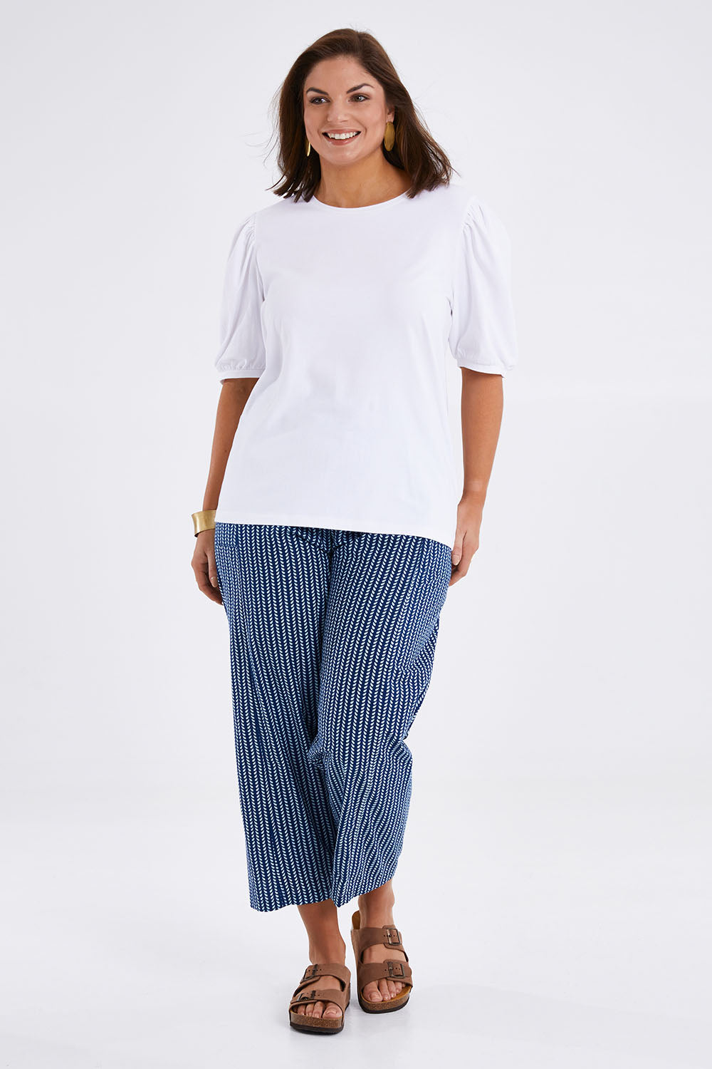 Model Monique wearing size 14 of the Sunday Brunch Tee in colour White (White), from the front, showing the whole outfit