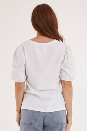 Model Sally wearing size 10 of the Sunday Brunch Tee in colour White (White), from the back