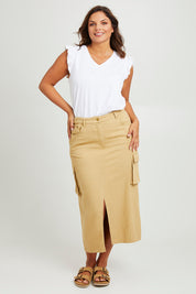 Model Monique wearing size 14 of the Carry Me With You Cargo Skirt in colour Sand, from the front, showing the whole outfit