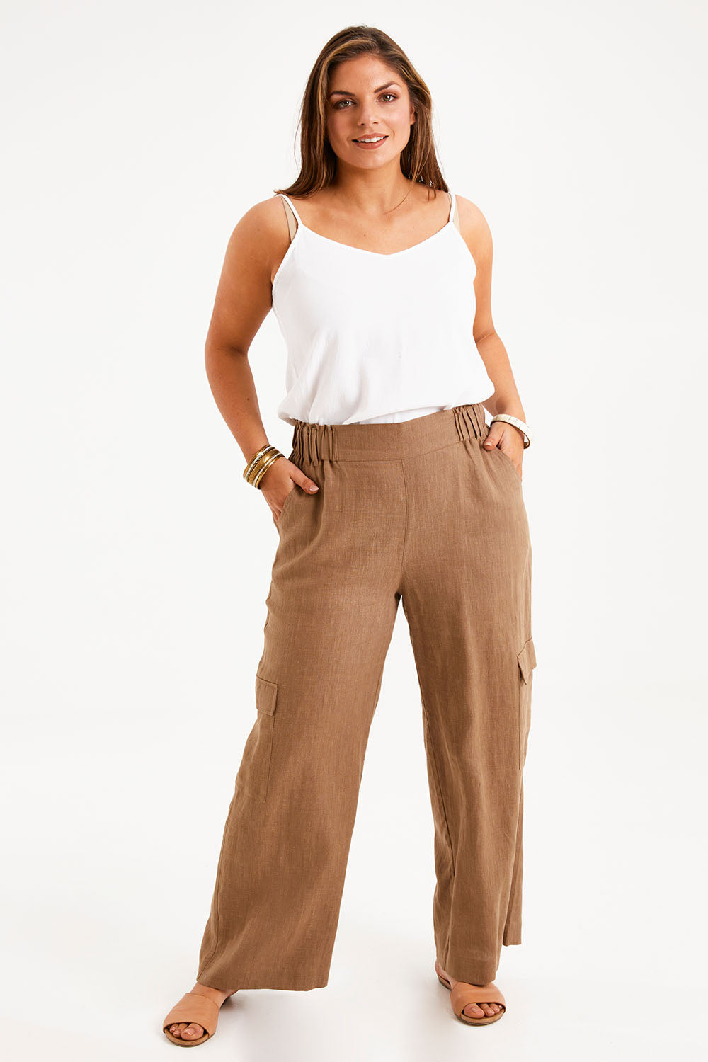 Model Monique wearing size 14 of the Always In Style Linen Cargo Pant in colour Camel, from the front, showing the whole outfit