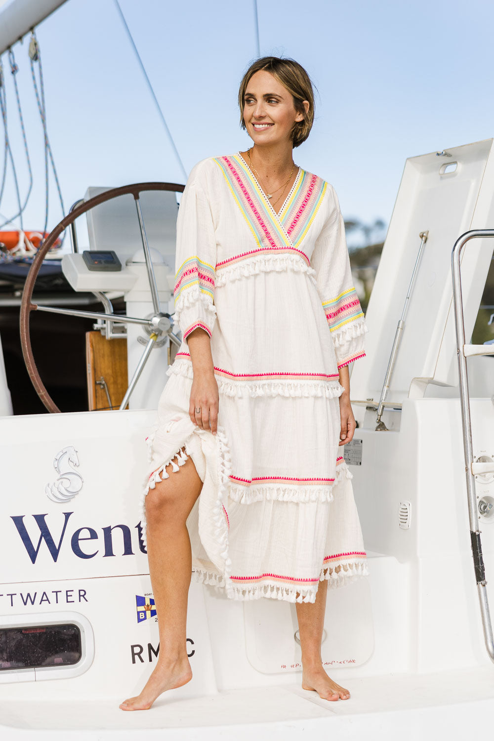 Model Tegan wearing size 10 of the State Of Mind Dress in colour White (White), from the front, showing the whole outfit