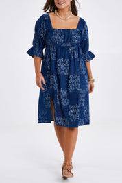 Model Monique wearing size 14 of the Sweet Memories Cotton Dress in colour Indigo (Blue), from the front, cropped image