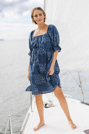 Model Tegan wearing size 10 of the Sweet Memories Cotton Dress in colour Indigo (Blue), from the front, showing the whole outfit