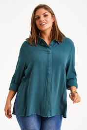 Model Monique wearing size 14 of the Brunch Lunch And Dinner Shirt in colour Sage (Green), from the front, cropped image