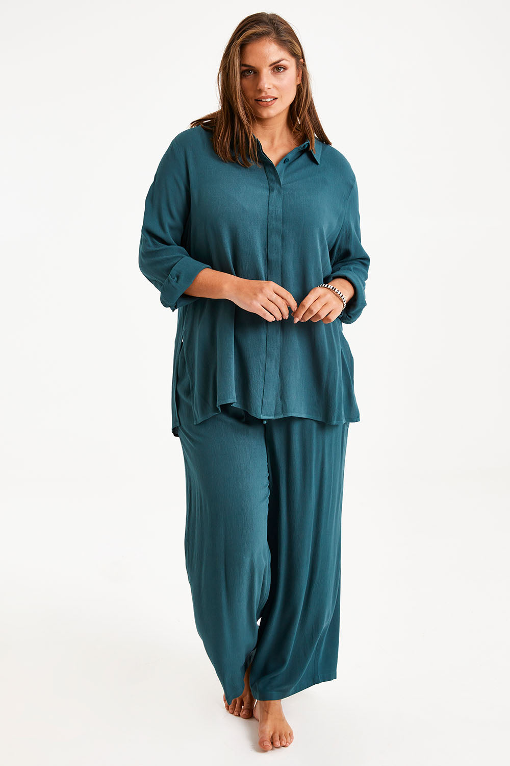 Model Monique wearing size 14 of the Brunch Lunch And Dinner Shirt in colour Sage (Green), from the front, showing the whole outfit