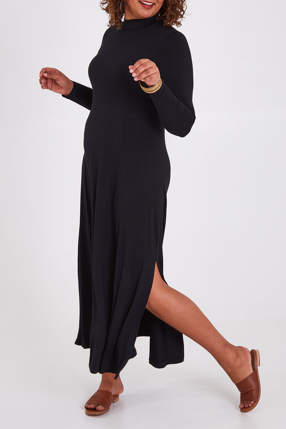 Model Anucia wearing size 14 of the My Faithful Maxi Tee Skivvy Dress in colour Black (Black), from the front, cropped image