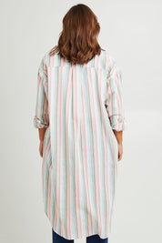 Model Monique wearing size 14 of the Happy Times Tunic Shirt in colour Stripe (Blue), from the back