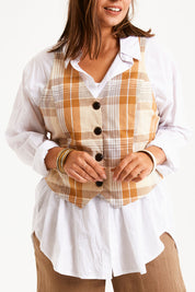 Model Monique wearing size 14 of the Ready And Able Checked Vest in colour Check, from the front, cropped image