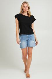 Model Grace wearing size 10 of the Coffee Run Skirt Set in colour Black (Black), from the front, showing the whole outfit