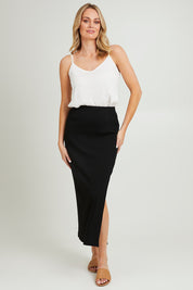 Model Grace wearing size 10 of the Coffee Run Skirt Set in colour Black (Black), from the front, showing the whole outfit