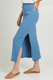 Model Grace wearing size 10 of the Coffee Run Skirt Set in colour Blue (Blue), from the front, cropped image