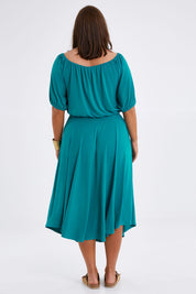 Model Monique wearing size 14 of the Light You Give On Or Off Shoulder Dress in colour Ultra (Green), from the back