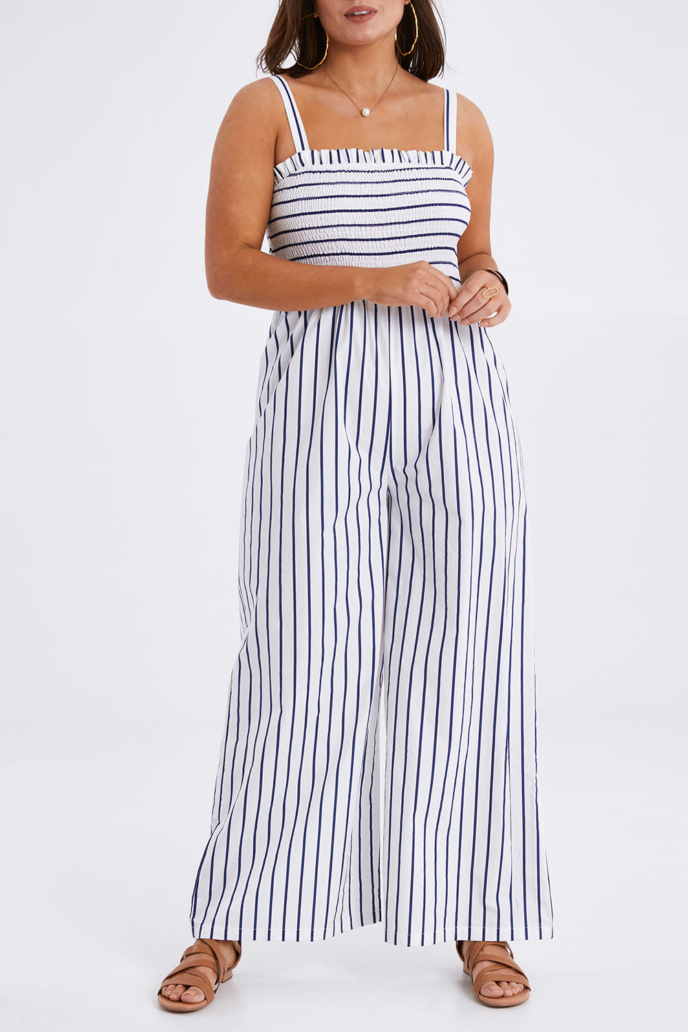 Model Monique wearing size 14 of the Locked In To Your Love Cotton Jumpsuit in colour Bluestripe (White), from the front, cropped image