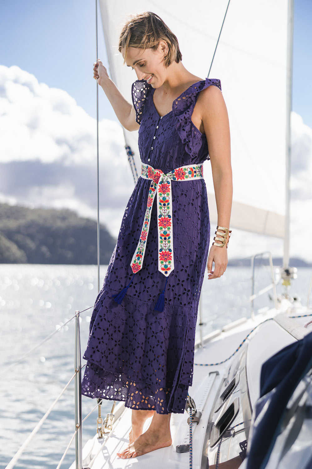 Model Tegan wearing size S-M of the Finishing Touch Embroidered Belt in colour Bright, from the front, showing the whole outfit