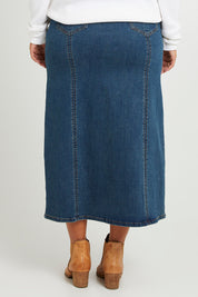 Model Monique wearing size 14 of the Easy As Pull On Panel Skirt in colour Darkdenim (Blue), from the back