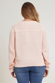 Model Chanel wearing size XL of the Cover Me In Cotton Sweater in colour Sherbet (Pink), from the back