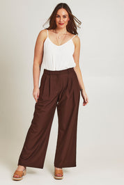 Model Jane wearing size 14 of the Elegant Persuasion Pants in colour Chocolate, from the front, showing the whole outfit