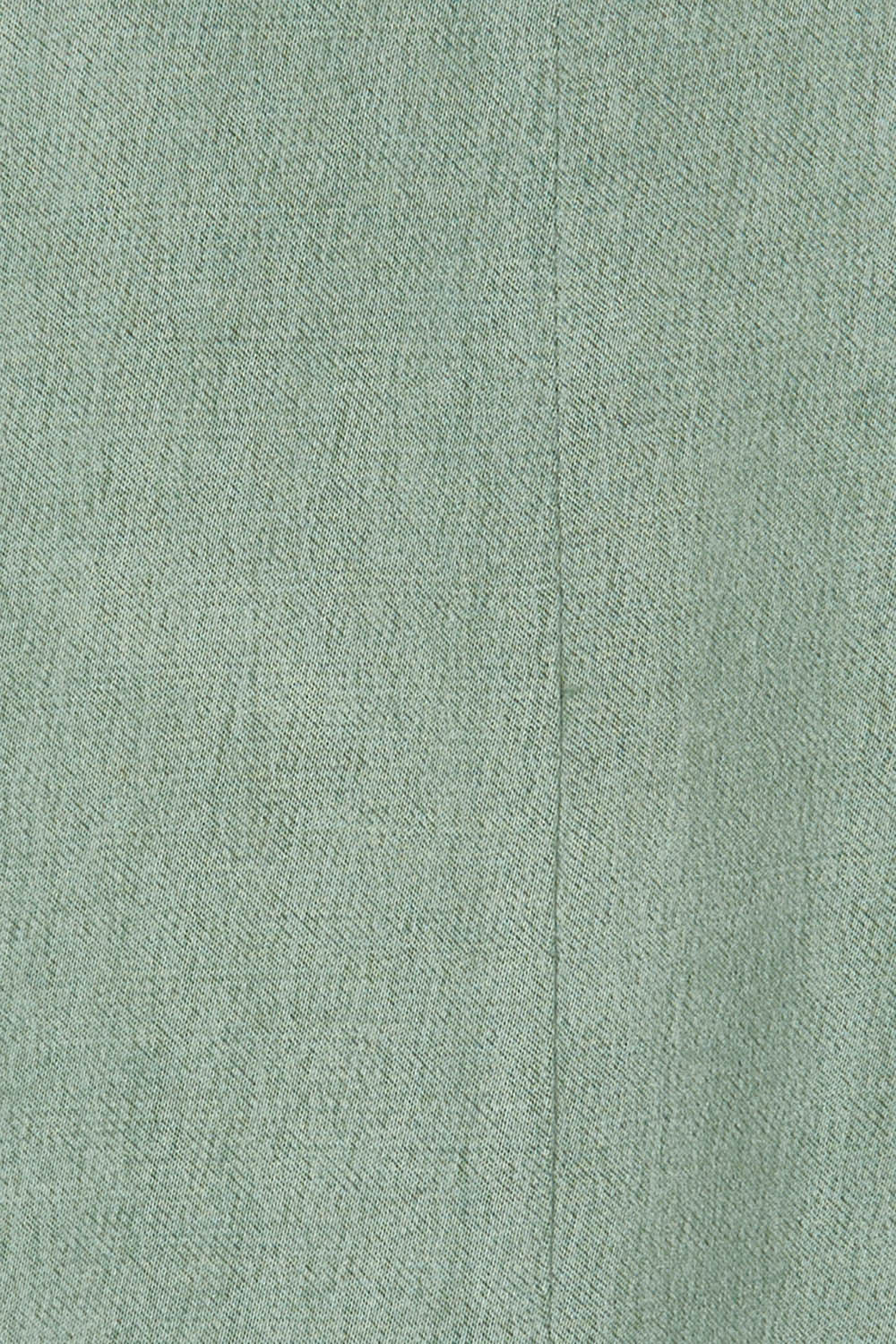 Product shot of the Rendezvous Cupro Jacket in colour Ivy (Green), detail