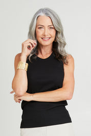 Model Noli wearing size 10 of the Can Do Tank Top in colour Black (Black), from the front, cropped image