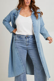 Model Laura wearing size 14 of the Wyatt Long Denim Dress in colour Denim (Blue), from the front, cropped image