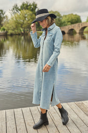 Model Tegan wearing size 10 of the Wyatt Long Denim Dress in colour Denim (Blue), from the front, showing the whole outfit