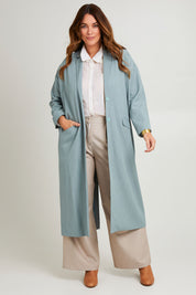 Model Laura wearing size 14 of the Suits Me Long Jacket in colour Dusk (Blue), from the front, showing the whole outfit