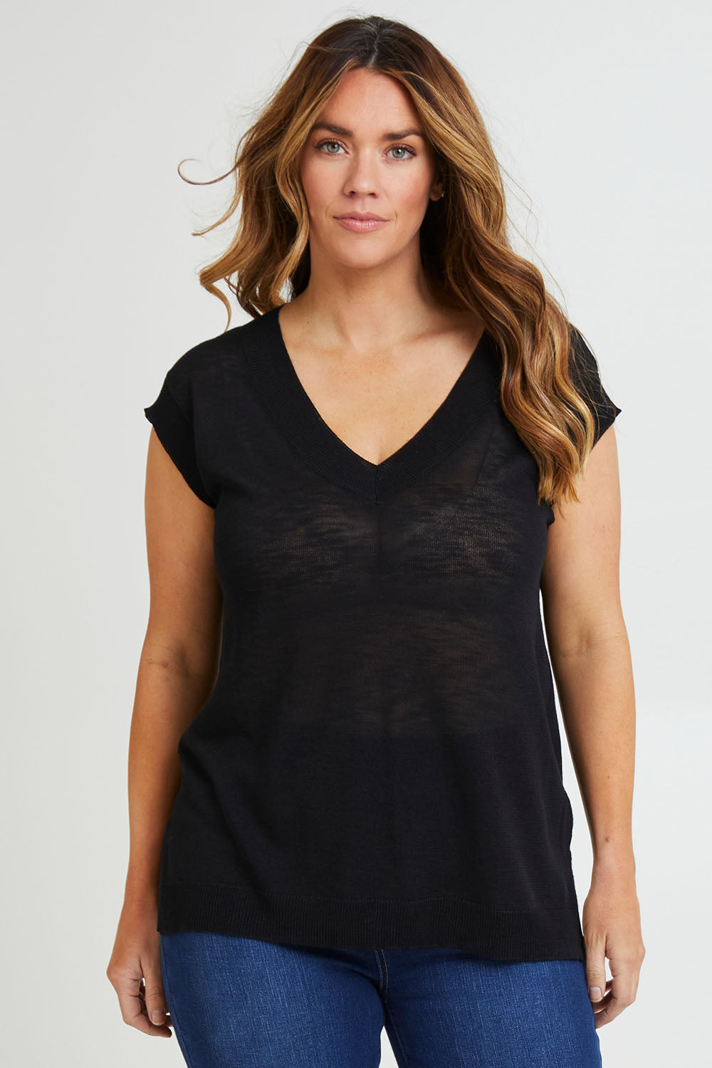Model Laura wearing size L of the Go To Knit Tank in colour Black (Black), from the front, cropped image
