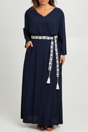 Model Monique wearing size 14 of the One Fine Day Cross Back Maxi in colour Darknavy (Blue), from the front, cropped image