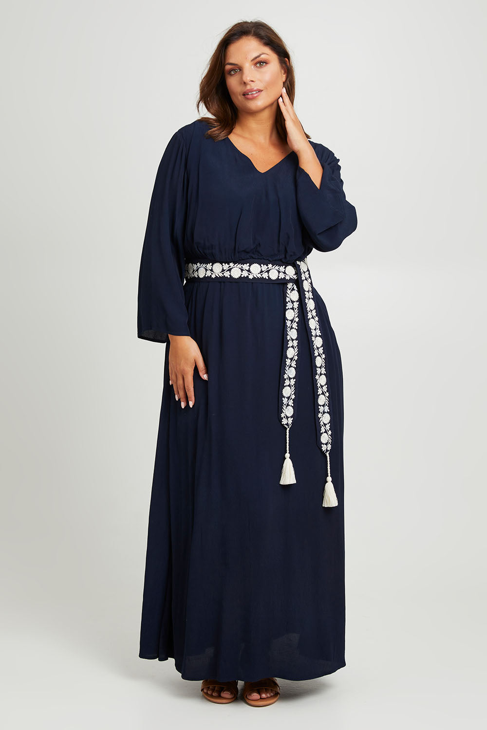 Model Monique wearing size 14 of the One Fine Day Cross Back Maxi in colour Darknavy (Blue), from the front, showing the whole outfit