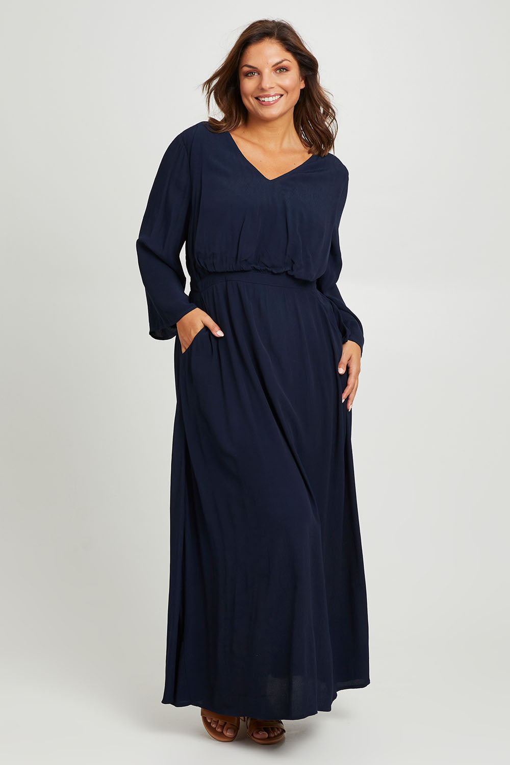Model Monique wearing size 14 of the One Fine Day Cross Back Maxi in colour Darknavy (Blue), from the front, showing the whole outfit