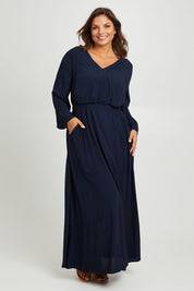 Model Monique wearing size 14 of the One Fine Day Cross Back Maxi in colour Darknavy (Blue), from the front, showing the whole outfit