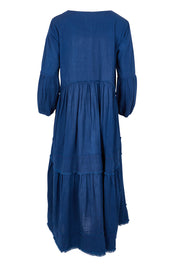Product shot of the Real Love Tiered Dress in colour Denim (Blue), from the back